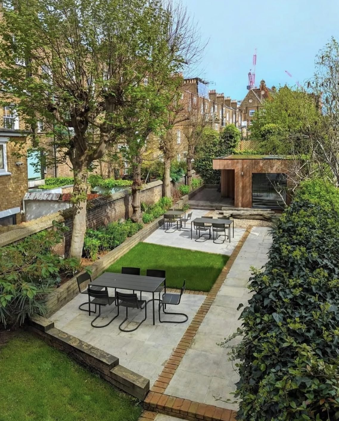 Courtyard garden transformation with porcelain paving and lawn panels